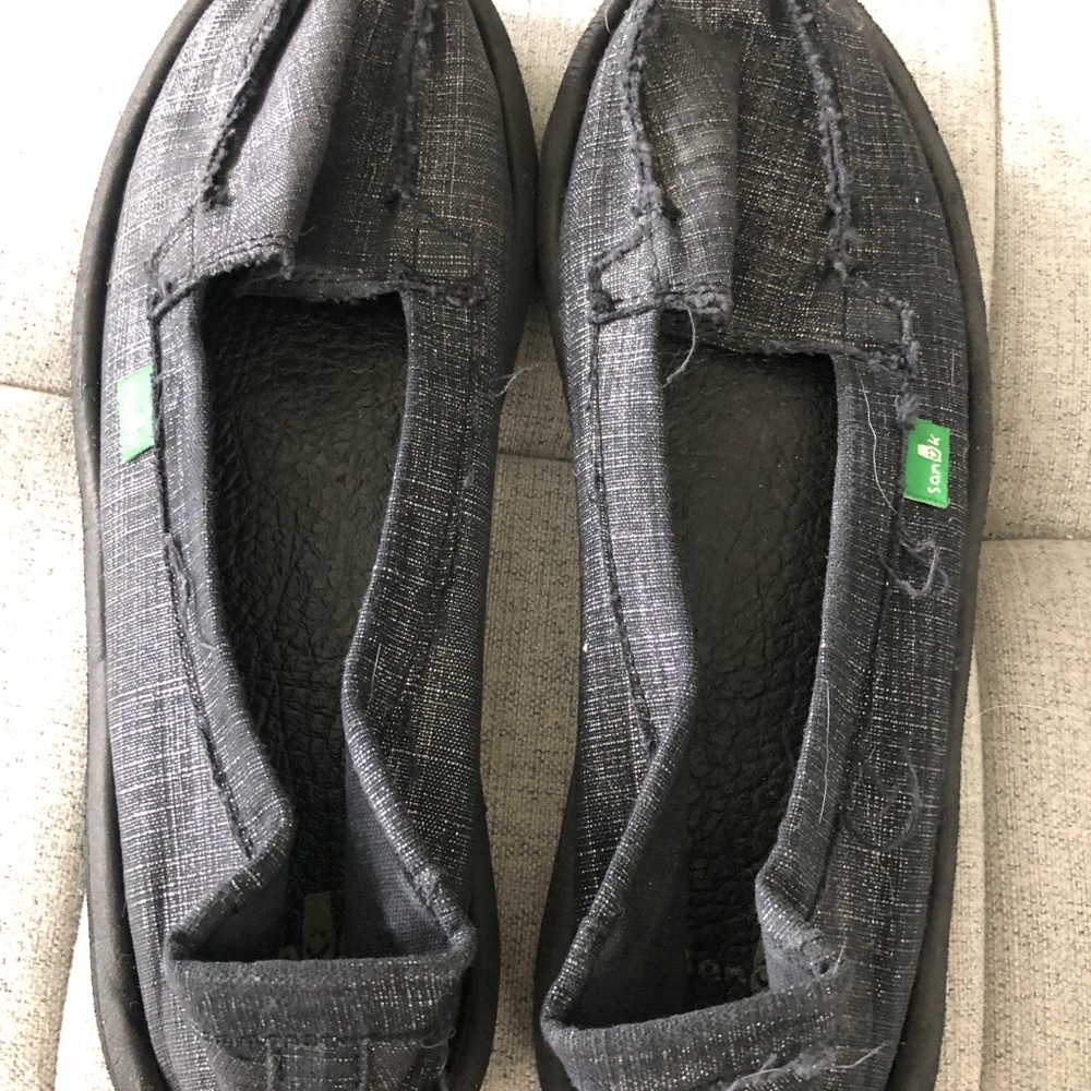 Like NEW Sanuks black metallic slip ons